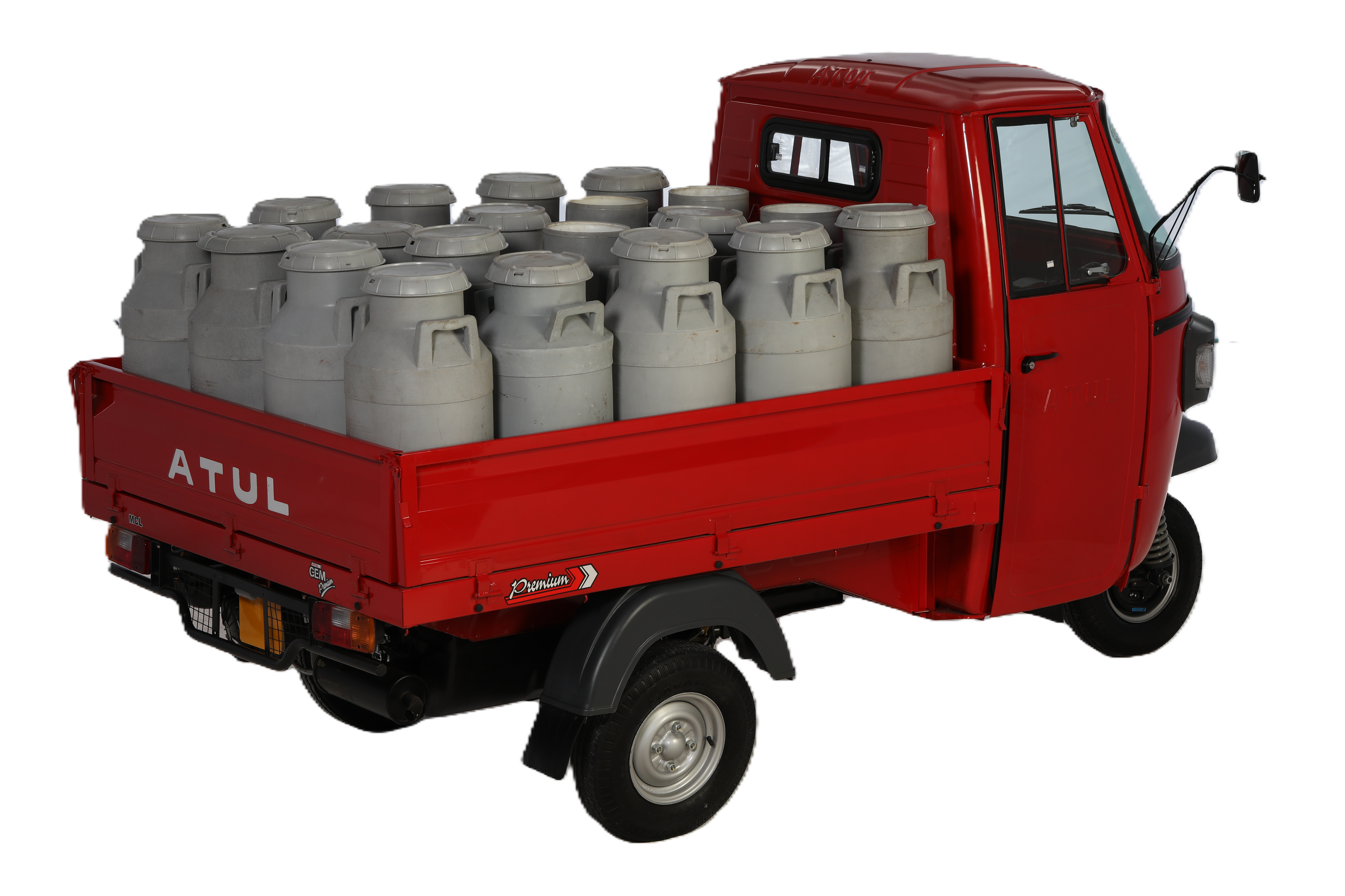 Atul GEM Cargo three-wheeler loaded with milk cans, showcasing its high load-carrying capacity