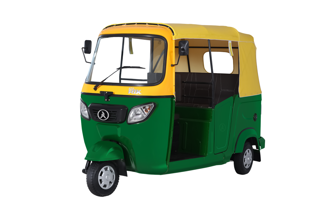 Atul RIK three-wheeler in green and yellow, representing Atul's CNG and LPG range launched in Peru